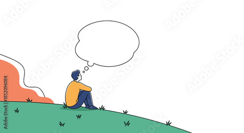Young man sitting alone on a grassy hill looking up at a blank thought bubble, contemplating, dreaming, or thinking of an idea.