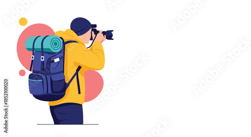 Male traveler with a large backpack and a beanie taking a photograph with a professional camera during his hiking adventure.