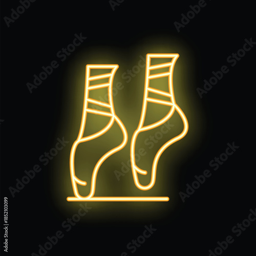 Yellow neon sign depicting ballet shoes standing on toes on a stage