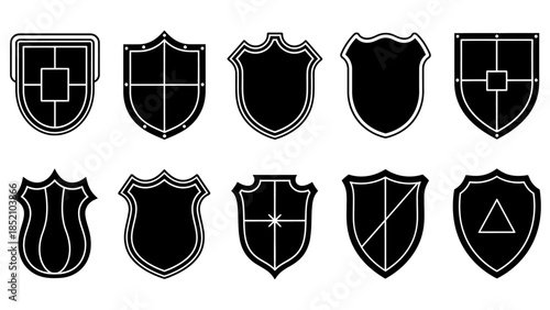 A collection of diverse shield designs featuring various shapes outlines and internal symbols in monochrome