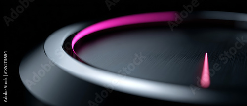 A close up of a circular dial with pink lights on it, the is pointing at zero