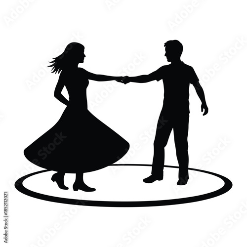 Couple dancing in silhouette on a circular stage