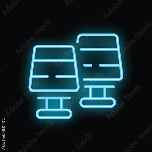Blue neon sign showing two empty office chairs with wheels on black background