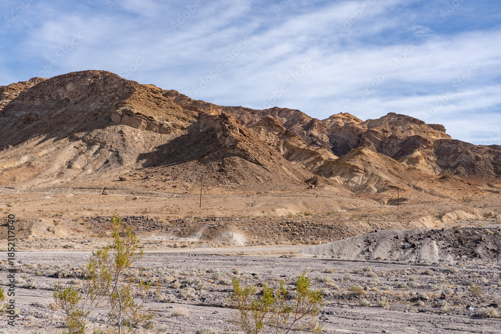 Fototapeta premium Death Valley National Park, Inyo County, California. Greenwater Range（Mojave Desert). Alluvial deposits near Ryan (former mining community). Furnace Creek Wash Road