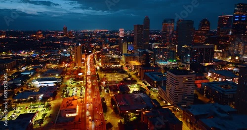 Wallpaper Mural Footage over the lively multi-lane highways brightly lit at night. Hectic traffic in downtown Houston, Texas, USA from drone. Torontodigital.ca