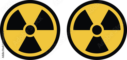 Dual nuclear radiation warning signs representing potential health and environmental hazards