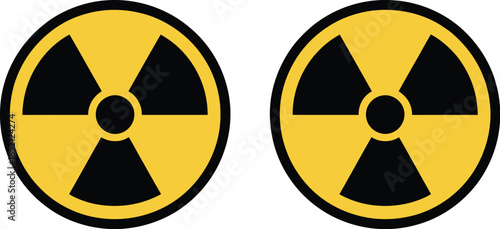 Pair of distinct warning symbols for radioactive materials and energy hazard zones