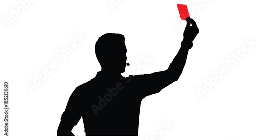 Referee displaying a red card in a dramatic moment a stark black silhouette