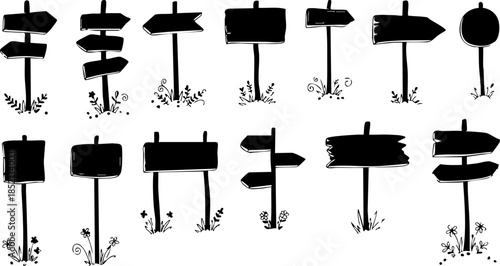 Black Direction Signs on White Background with Grass