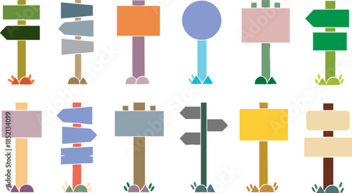 Colorful Directional Signs on Wooden Poles