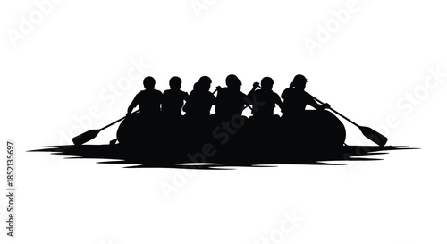 A team of rowers in a boat gliding across water a striking silhouette