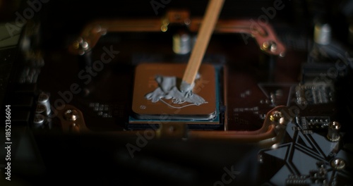 Applying Thermal Paste on Computer CPU During Replacement
