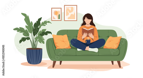 A young woman is relaxing comfortably on a green sofa with a cup of coffee, deeply engrossed in reading a book in her cozy living room.