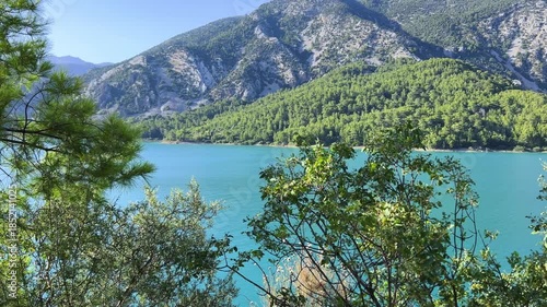 Dam lake in the Green Canyon in Turkey. Mountain lake Oymapinar. The Emerald reservoir behind the Oymapinar dam in the Manavgat region.View of the Taurus Mountains. 4К
