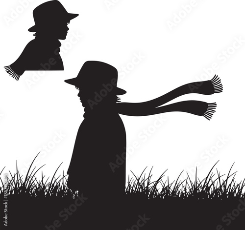 Silhouette of a child in a hat and scarf standing in grass with wind blowing the scarf, evoking a sense of autumn or breezy weather and childhood also transparent background