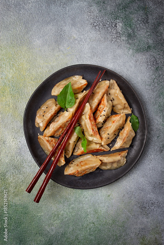 japanese fried dumplings, gyoza, sesame seeds, top view, no people,