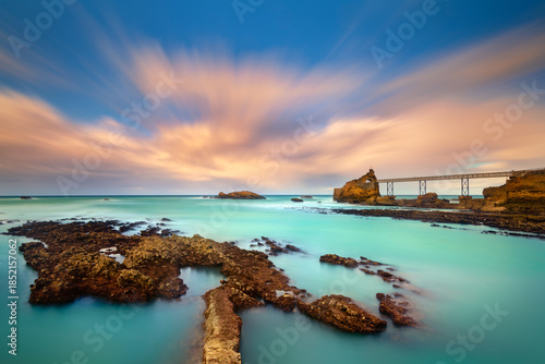 Metal bridge leading to the Rock of the Virgin (Rocher de la Vierge) at sunrise, Biarritz, Pyrenees-Atlantiques, Nouvelle-Aquitaine, France