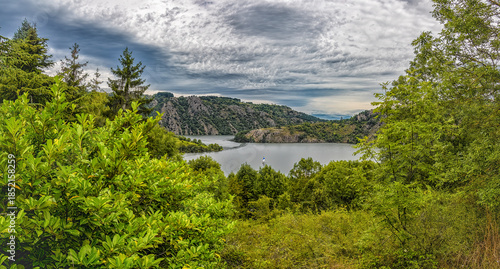 Картината върху платно Overlooking lake grangent and surrounding green mountains in Auvergne-Rhône-Alpe