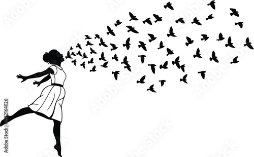 Silhouette of a woman in a dress releasing a flock of birds into the sky girl