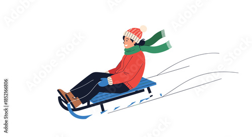 A person enjoys a thrilling sledding adventure down a snowy hill on a winter day. .