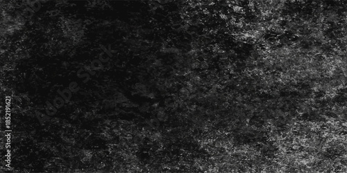 A dark and grungy black snow background features a textured stone wall pattern with an aged grey surface and rough vintage paper backdrop for a seamless old metal design. grainy scratched chalkboard