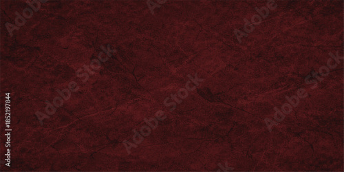 A dark red grunge leather texture features a rough vintage pattern and weathered material surface suitable for a blank Christmas backdrop or old textile wallpaper design