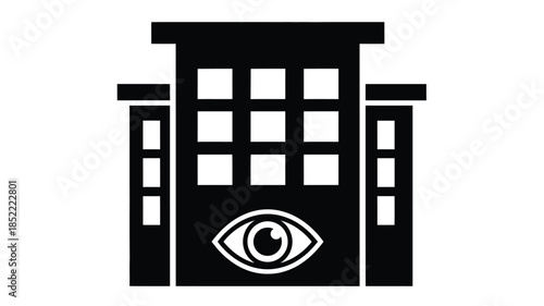 Black silhouette of a building with an eye integrated into its facade design