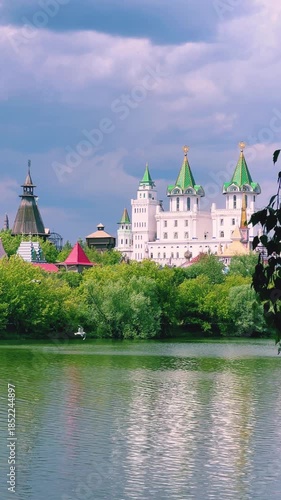 Russian traditional architecture, the Kremlin in Izmailovo, on the shore of a pond, Moscow. The architectural ensemble is stylized under Russian architecture of the 16-17 centuries. Gingerbread houses