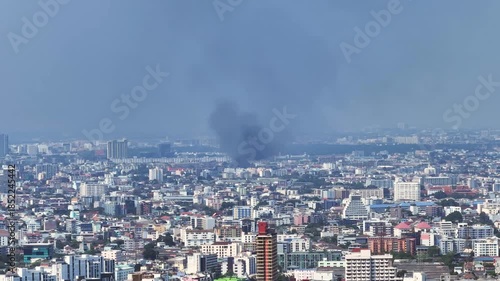 Wallpaper Mural Fire incident in Bangkok city with visible smoke and flames in urban area Torontodigital.ca