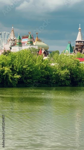 Russian traditional architecture, the Kremlin in Izmailovo, on the shore of a pond, Moscow. The architectural ensemble is stylized under Russian architecture of the 16-17 centuries. Gingerbread houses