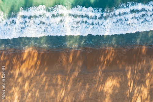 Aerial view from a drone of beautiful beach and coastline of Phuket island, Thailand.