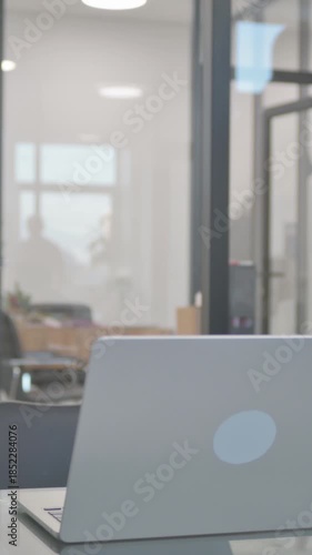 Wallpaper Mural African Man Leaving Office after Working on Computer, vertical video Torontodigital.ca