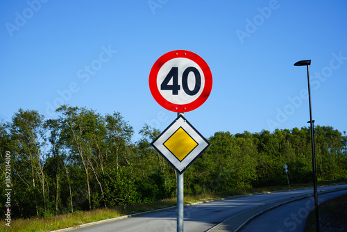 Main road traffic sign with 40 km/h speed limit. Close-up.