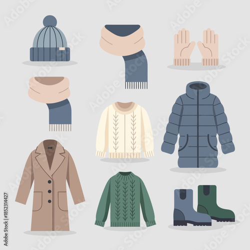 Collection of warm winter clothing and accessories including coat scarf gloves and boots for cold