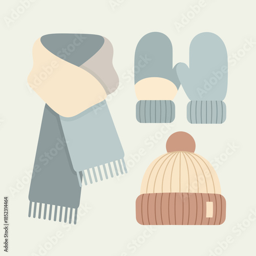Cozy winter accessories including knitted hat mittens and scarf in soft pastel colors perfect for