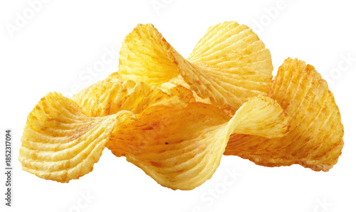 Pile of crinkle-cut potato chips with light seasoning on black