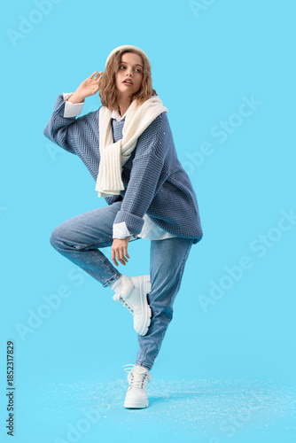 Stylish young woman in wint...