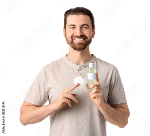 Handsome man with bottle of...
