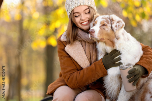Young woman with coffee cup...