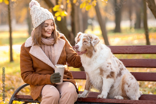 Young woman with coffee cup...