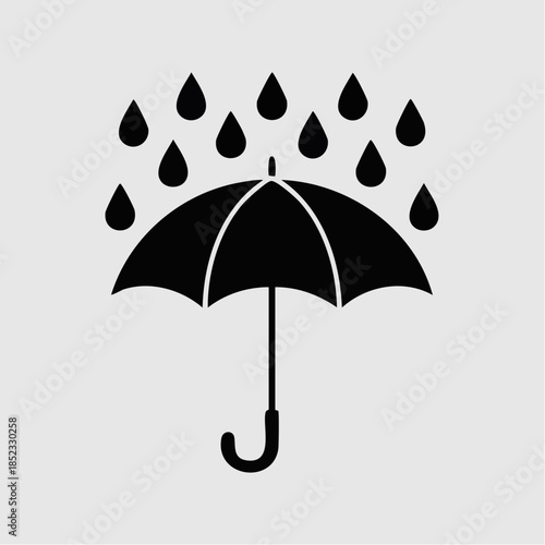 Black silhouette of umbrella with raindrops for rainy season