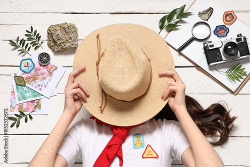Female scout with herbarium...
