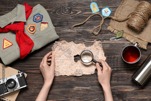 Female hands with map and s...