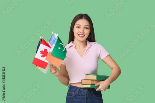 Young Asian woman with flag...