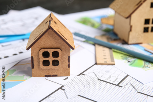House figure with zoning pl...