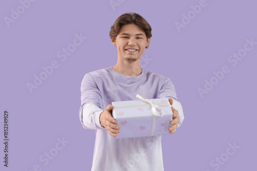 Handsome young man with gif...