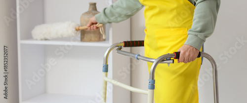 Mature woman with walker an...
