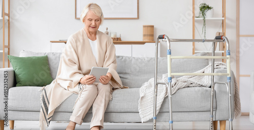 Senior woman with walker us...