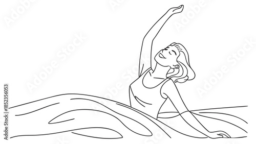 Serene woman stretching in yoga pose with peaceful expression