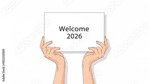 Hands holding a white sign with welcome 2026 text on a plain background